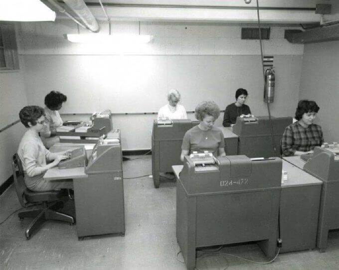Computer programmers operating  @IBM  keypunch machines, 1960s