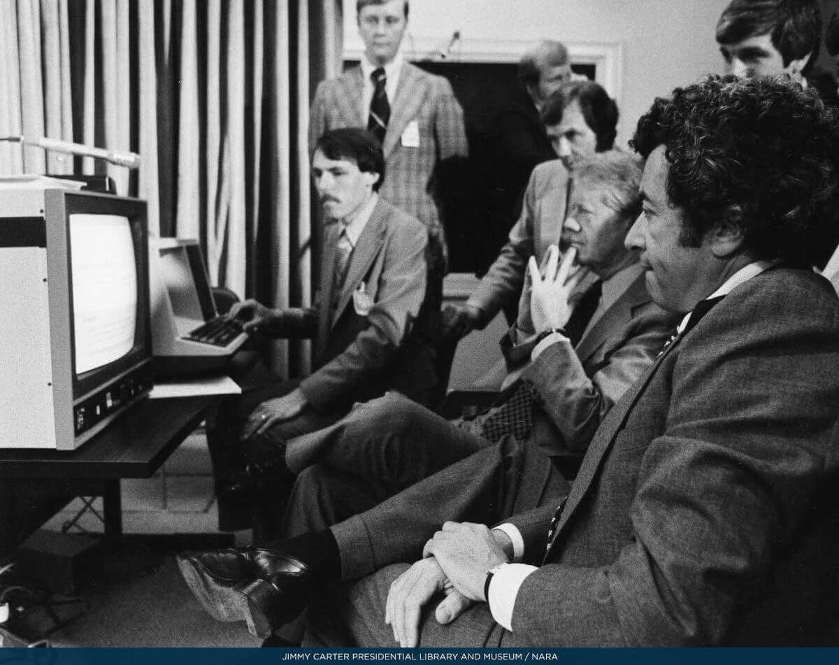 President Carter oversees the installation of the first computer in the White House